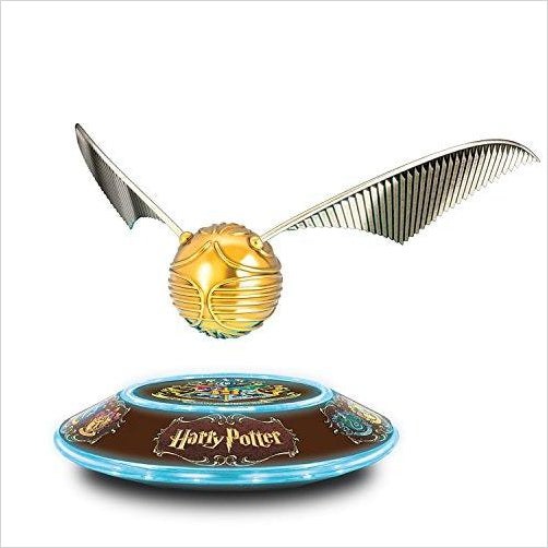 The Harry Potter Levitating Golden Snitch Sculpture with Light Up Base