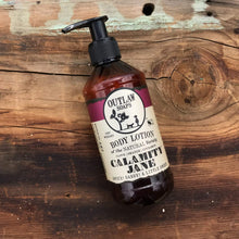 Load image into Gallery viewer, Calamity Jane Natural Lotion: Smells like Whiskey, Clove, Orange, and a Little Cinnamon - Gifteee Unique &amp; Unusual gifts, Cool gift ideas
