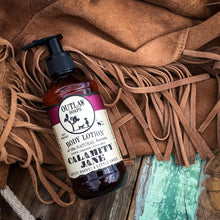 Load image into Gallery viewer, Calamity Jane Natural Lotion: Smells like Whiskey, Clove, Orange, and a Little Cinnamon - Gifteee Unique &amp; Unusual gifts, Cool gift ideas
